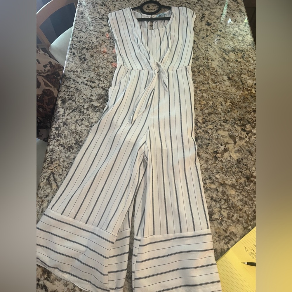Cute blue and white strip romper with pockets!